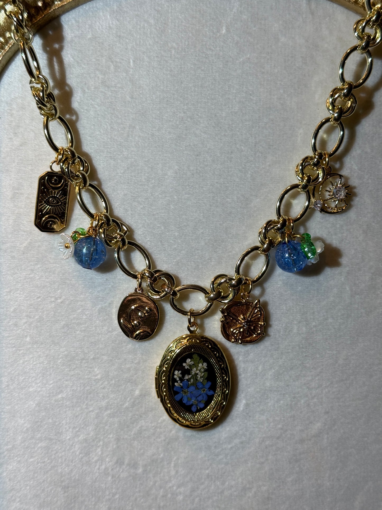 Gold charm necklace (c)