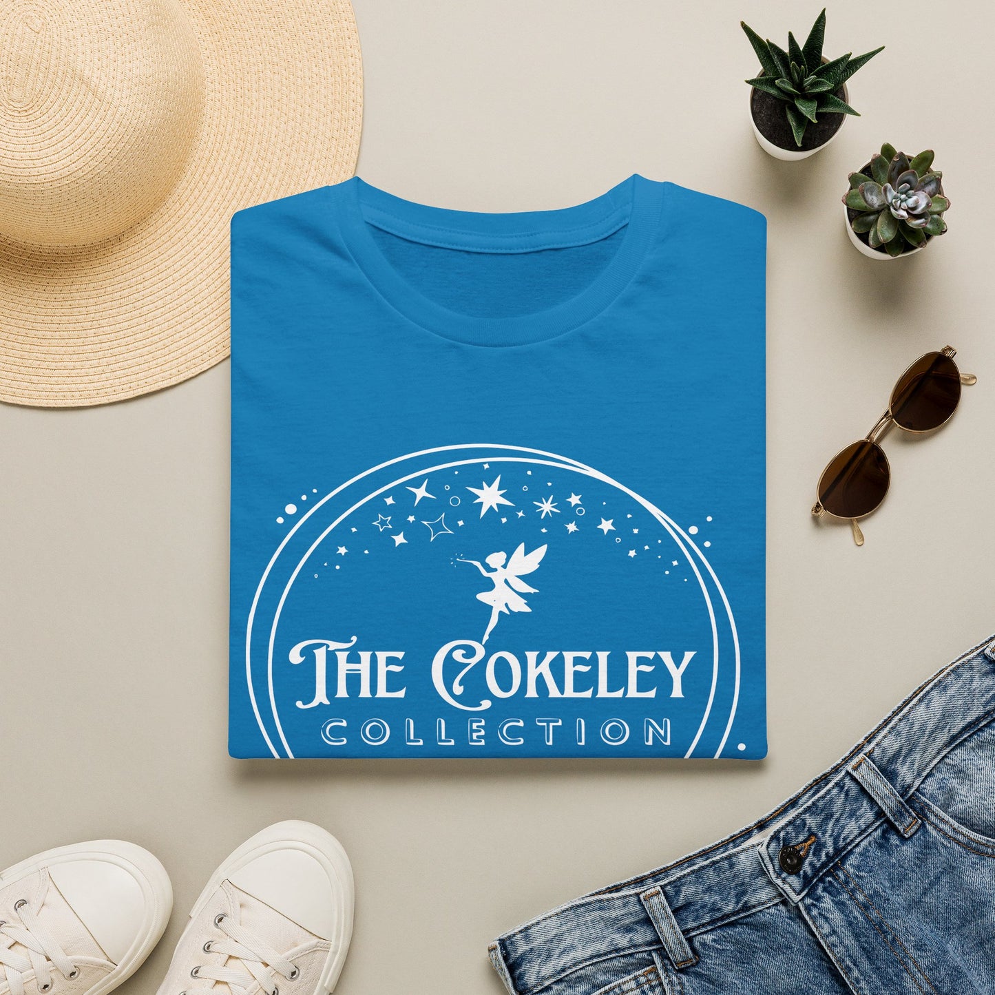 The Cokeley Collection T-Shirt | Fairy Logo, Starry Circle Design