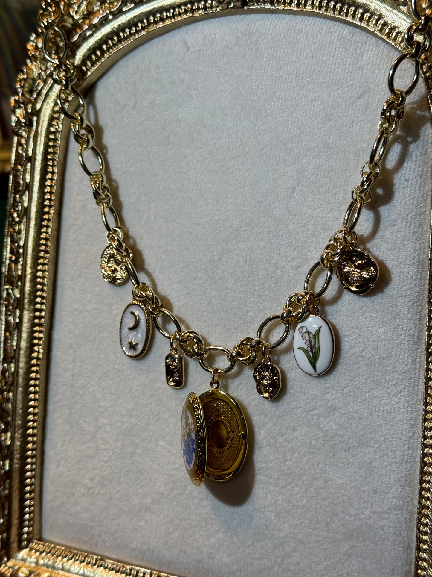 Gold locket charm necklace (a)