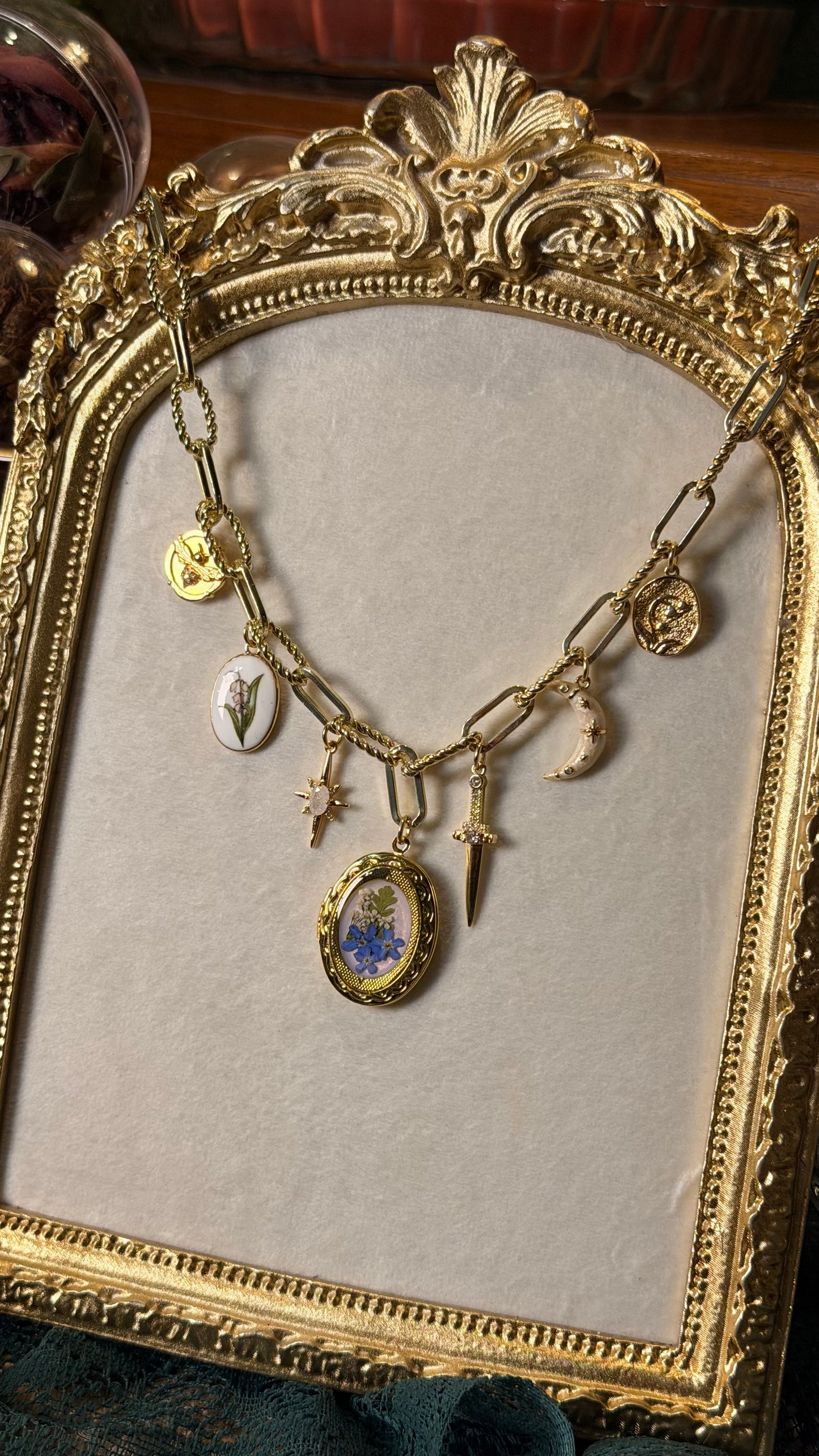 Gold locket charm necklace (f)