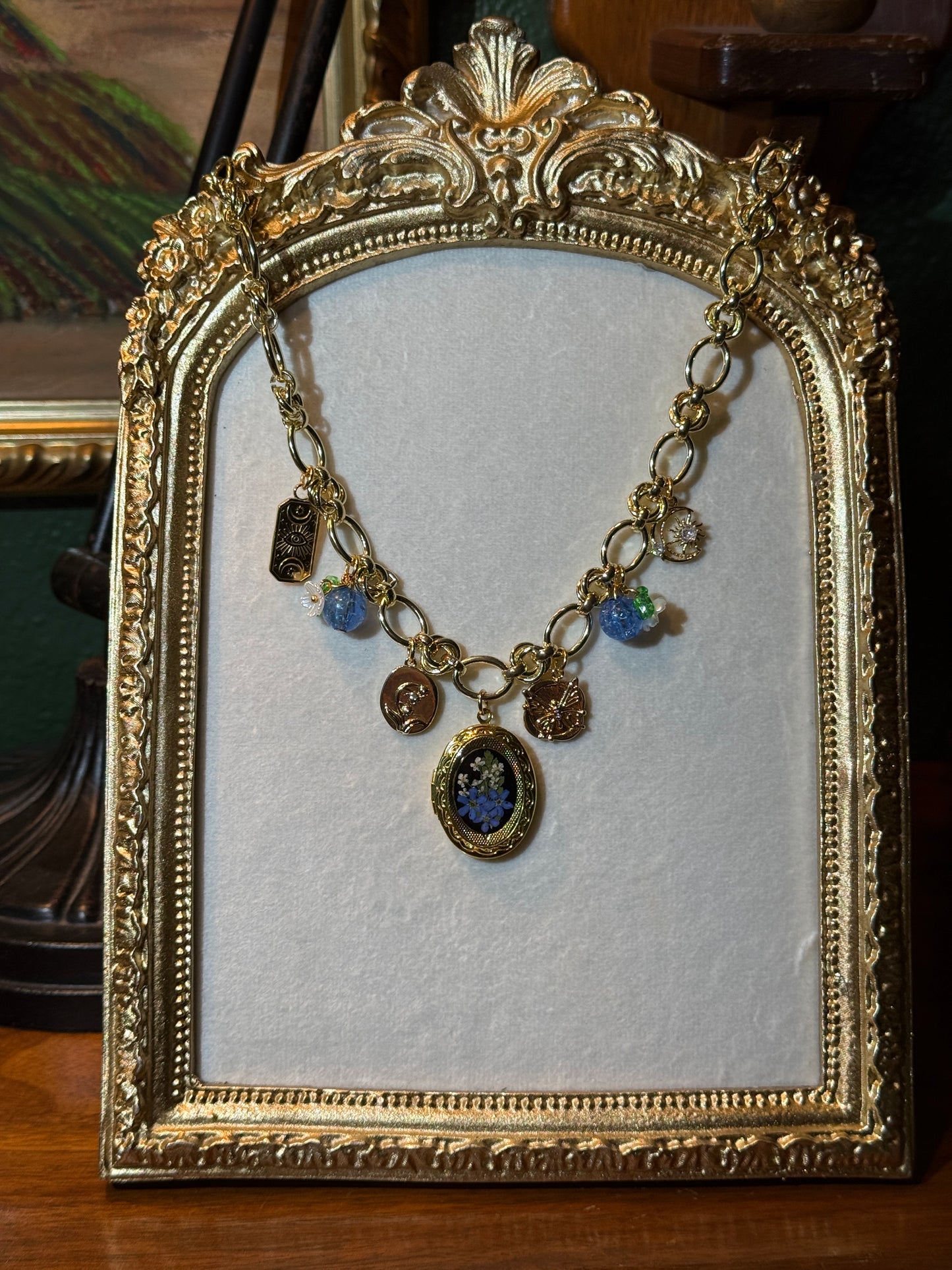 Gold charm necklace (c)