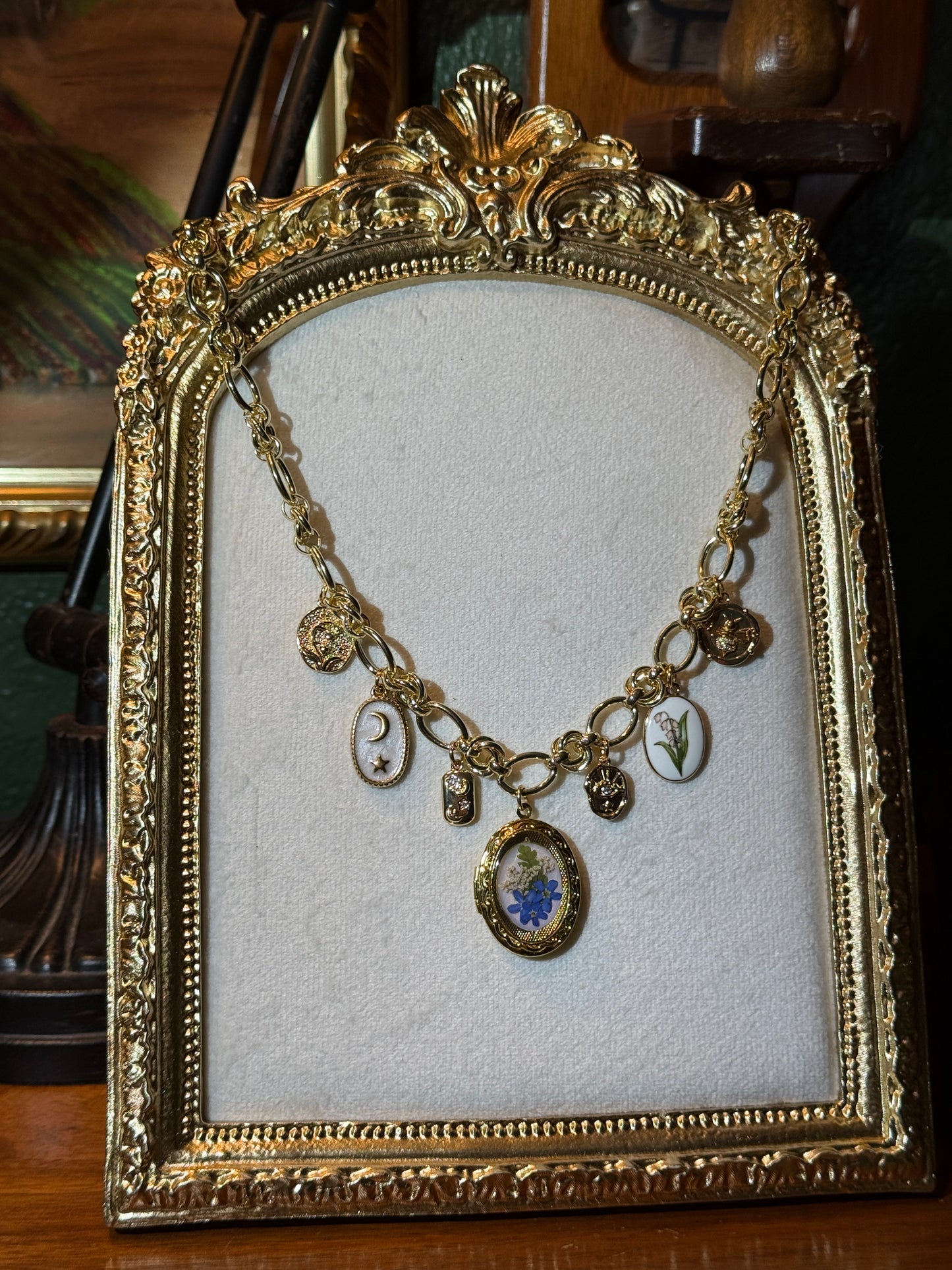 Gold locket charm necklace (a)