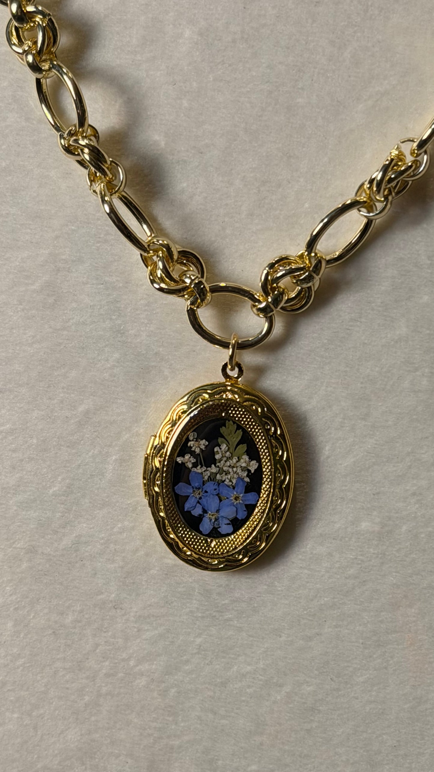 Gold locket necklace blue forget me nots