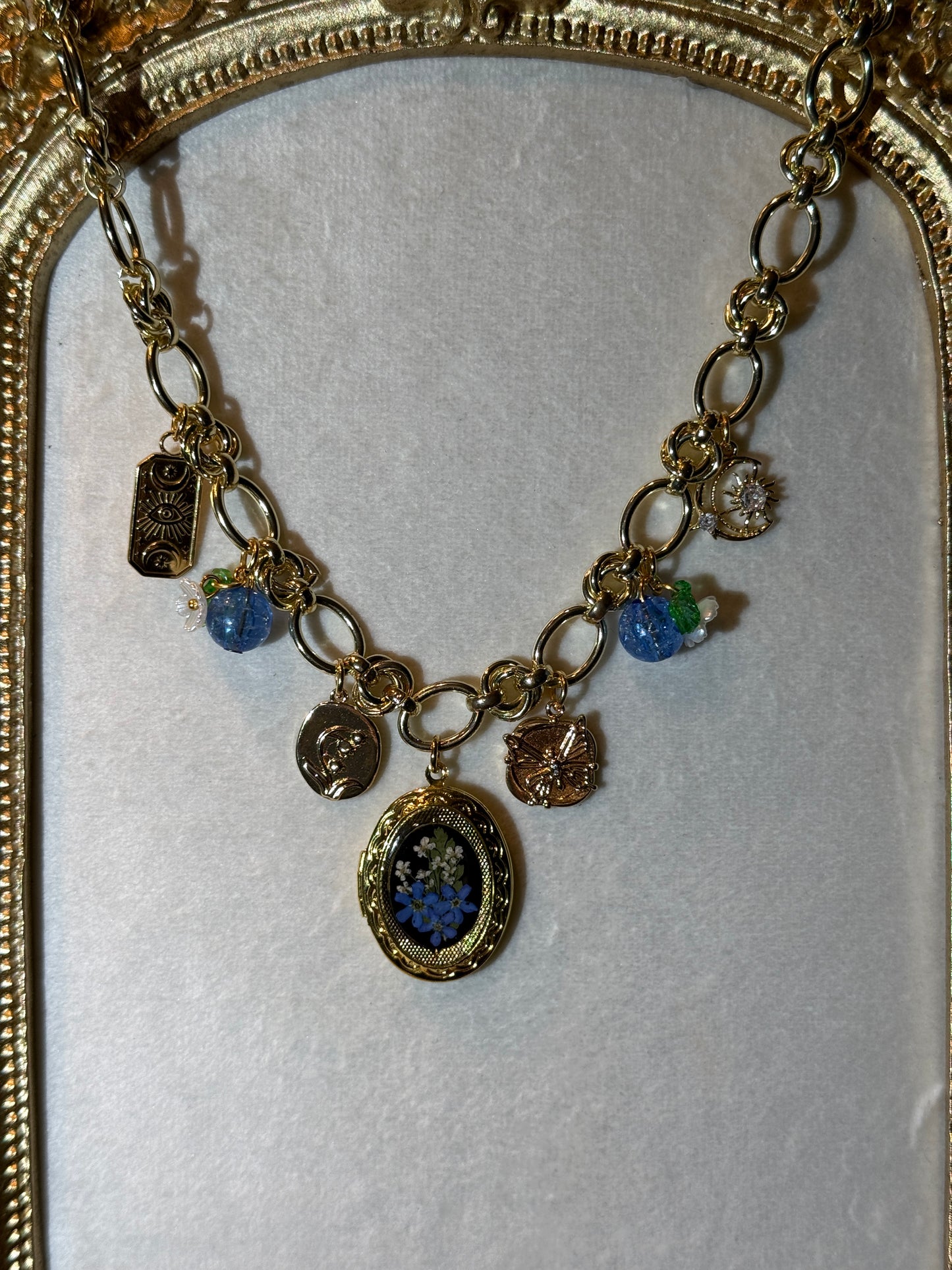 Gold charm necklace (c)