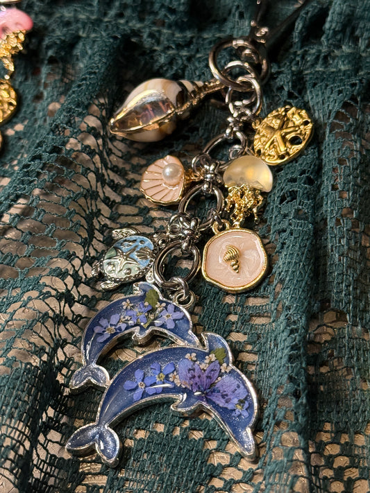 Silver dolphin bag charm