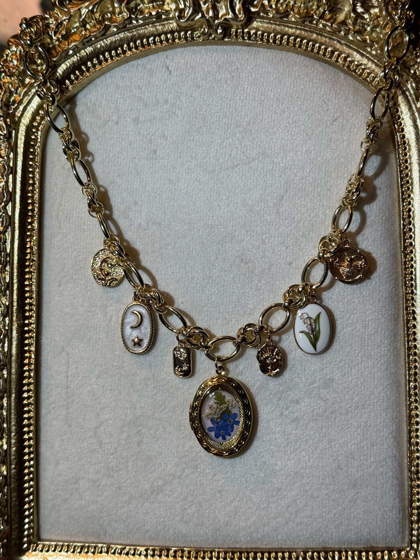 Gold locket charm necklace (a)