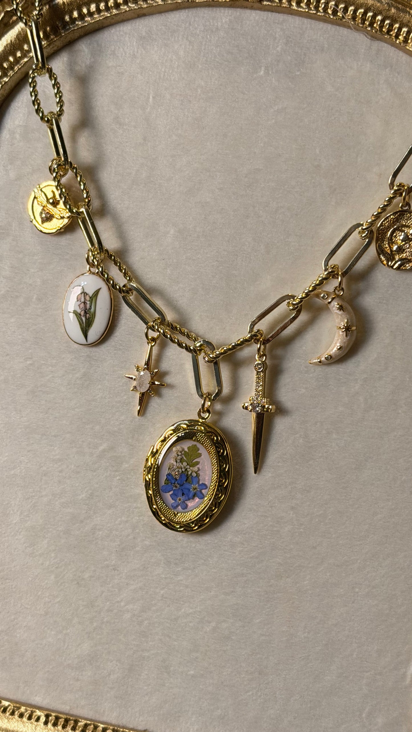 Gold locket charm necklace (f)