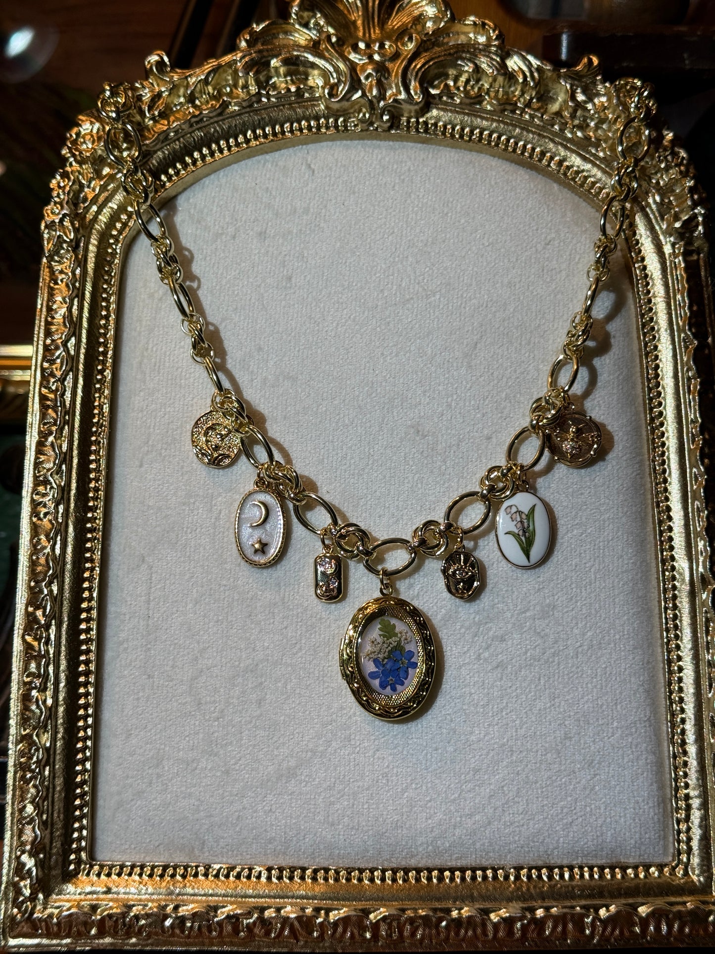 Gold locket charm necklace (a)